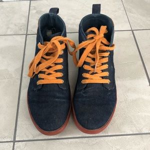 Jean vlado means sneakers